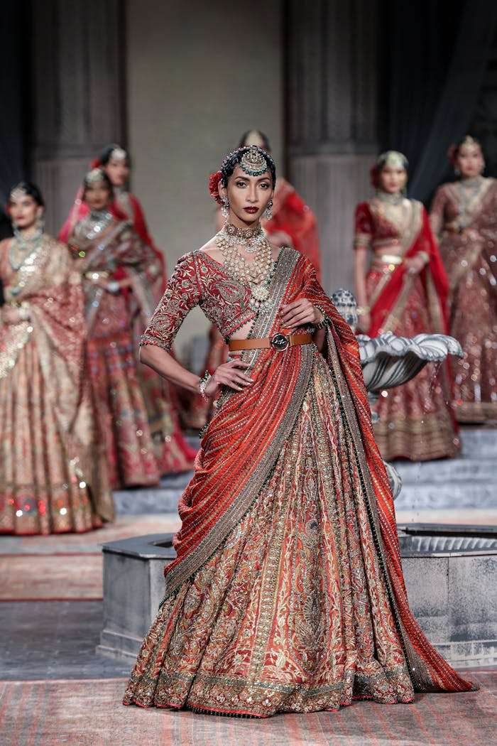 Stunning Indian model showcasing traditional attire at a New Delhi fashion show.